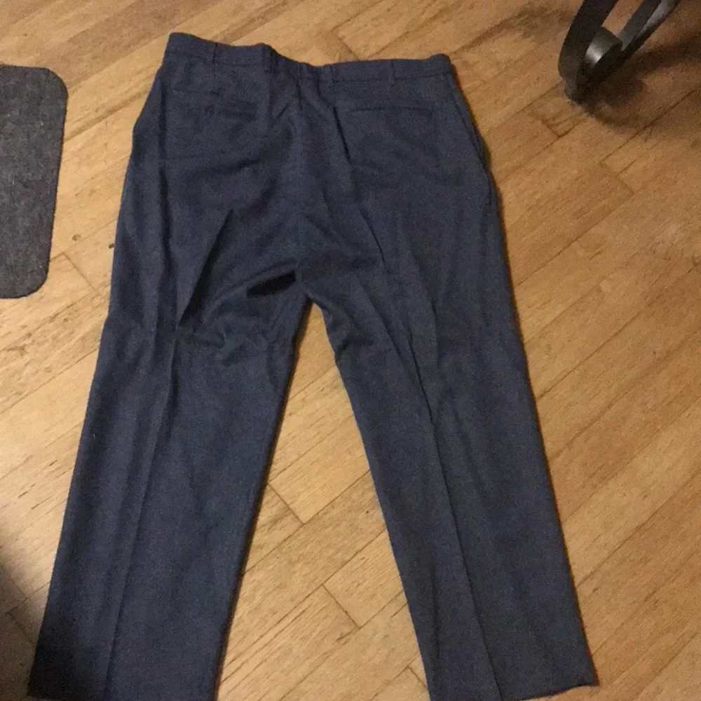 Action slacks By Levi Strauss and Company men 38